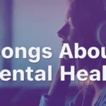 A calm young woman wearing headphones in a soft blue-purple room, listening to music and reflecting, representing songs about mental health.