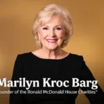 Portrait of Marilyn Kroc Barg with a warm background, highlighting her role connected to Ronald McDonald House Charities.
