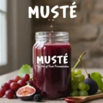 Jar of fermented fruit Musté surrounded by grapes and figs on a rustic table